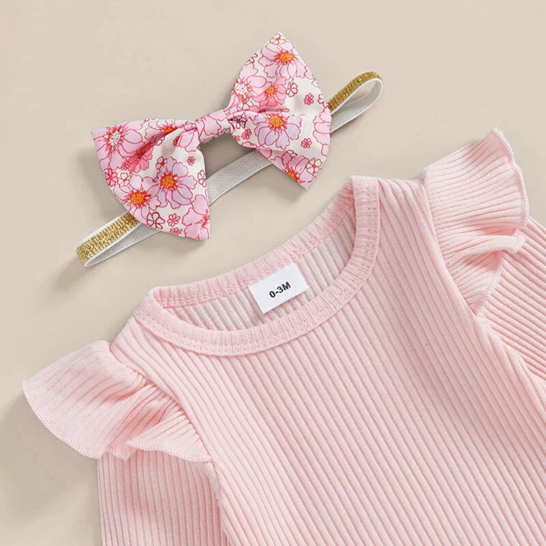Floral Flutter Set | Adorable 3-Piece Baby Girl Outfit in pink - closeup of ribbed romper