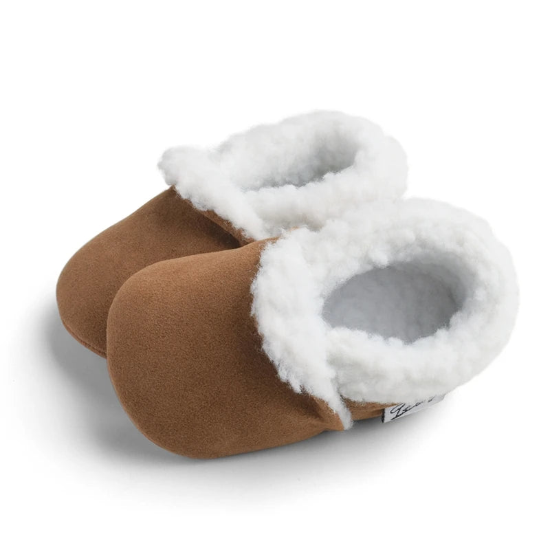 Brown baby moccasins with fluffy lining