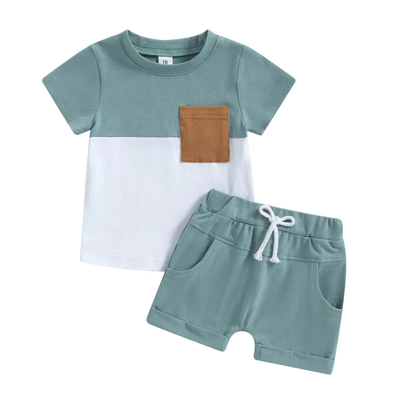 Fynn Colour Block Shorts Set with short-sleeve T-shirt and contrast pocket, paired with comfortable shorts, perfect for toddlers.