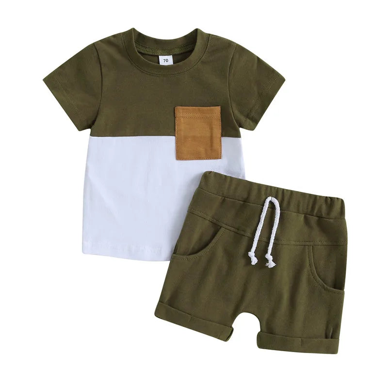 Fynn Colour Block Shorts Set featuring green and white T-shirt with contrast pocket and matching shorts for baby boys.