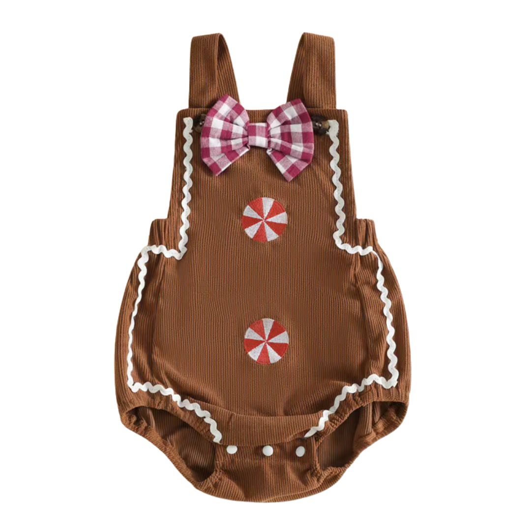 Brown ribbed gingerbread baby Christmas romper with a red and white gingham bow tie, white icing trim, and candy buttons