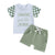 "Handsome Just Like My Daddy" baby boy outfit, including slogan tee with checkered sleeves and coordinating green shorts. 