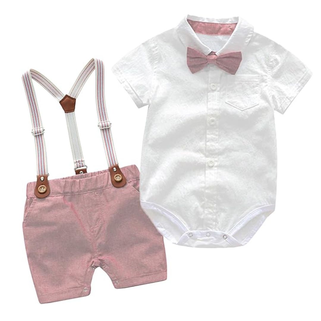 Baby boy formal outfit including collared onesie with bow tie, pink shorts and suspenders