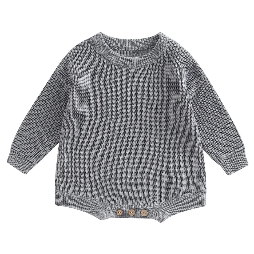 Grey knit baby romper with long sleeves and button detailing, perfect for winter snugness.
