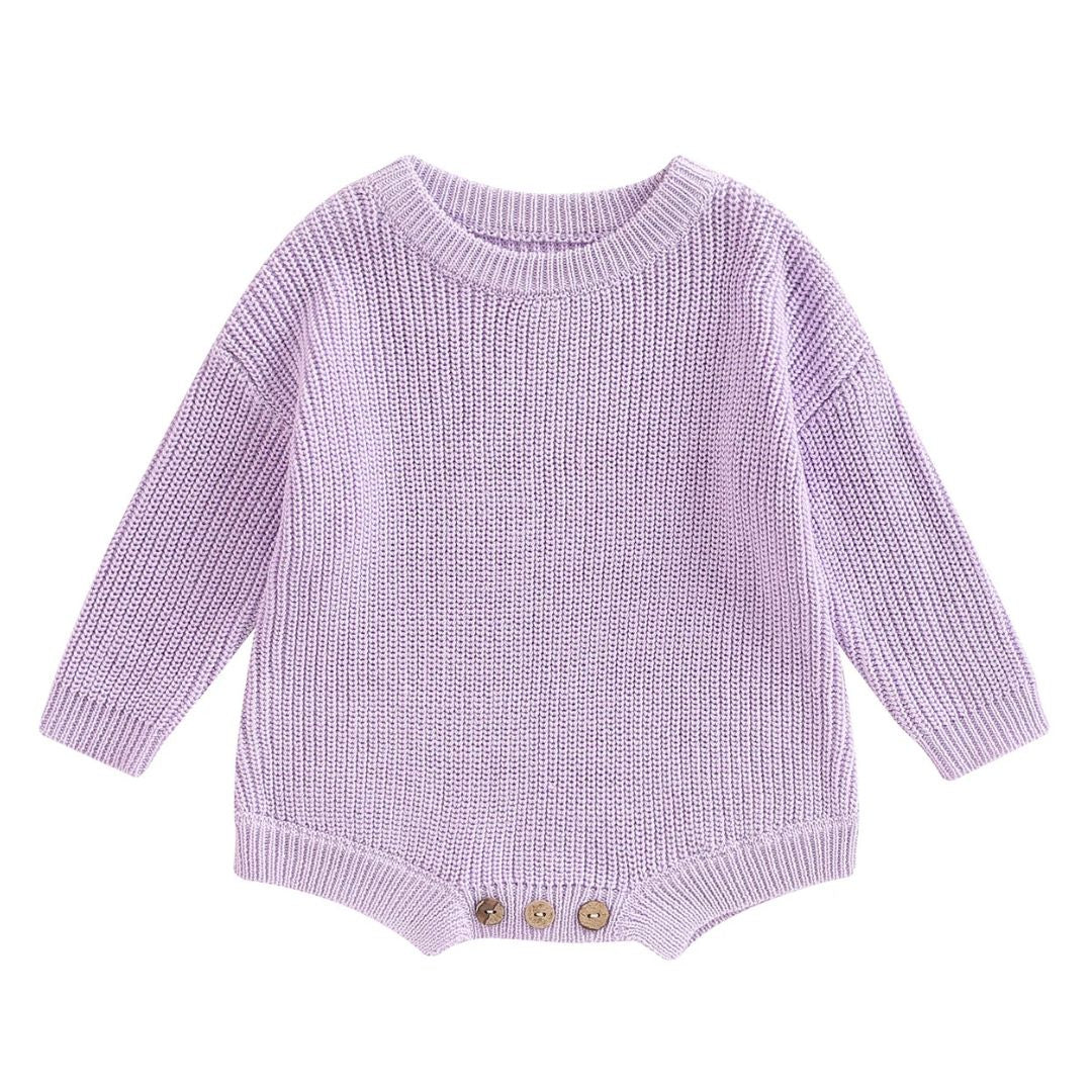 Knitted baby romper in lavender with long sleeves and button detail, perfect winter outfit for little ones.