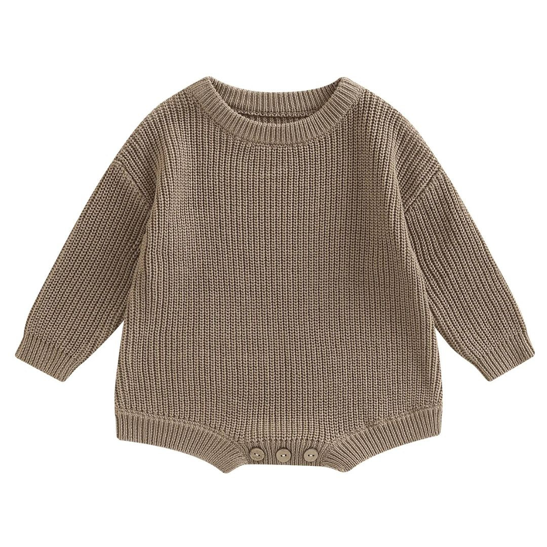Chunky knit baby romper in taupe, featuring long sleeves and buttons, perfect for winter snuggles.