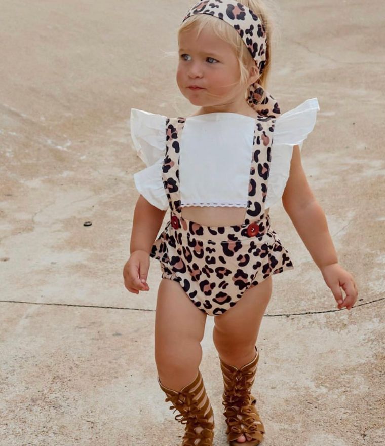 Toddler girl wearing Leopard Pinafore Romper