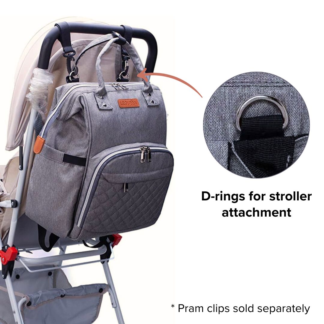 LeQueen Quilted Nappy Backpack attached to pram
