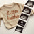 Baby announcement photo idea, featuring a Little Brother jumper and ultrasound images