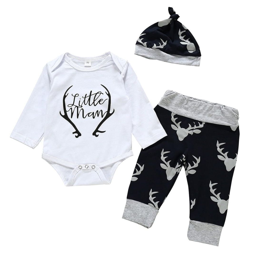 Baby outfit set with white long-sleeve romper, black pants with deer pattern, and matching hat on a white background.
