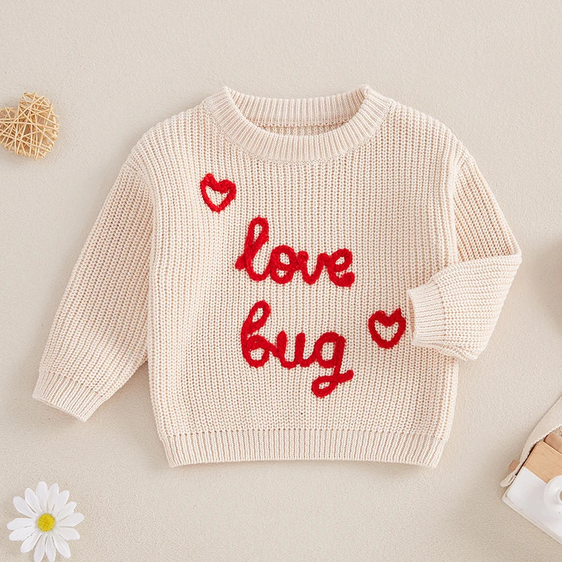 Beige baby knit jumper with red "love bug" and heart embroidery