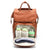Nappy backpack in tan vegan leather with insulated bottle pockets