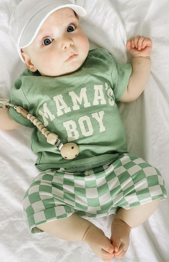 Baby boy wearing green "Mama's Boy" outfit from Lulu Babe