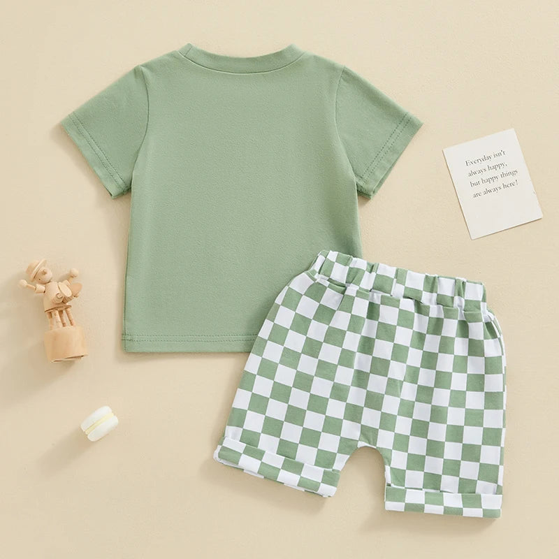 Green baby boy outfit - Mama's Boy top and check shorts - back view