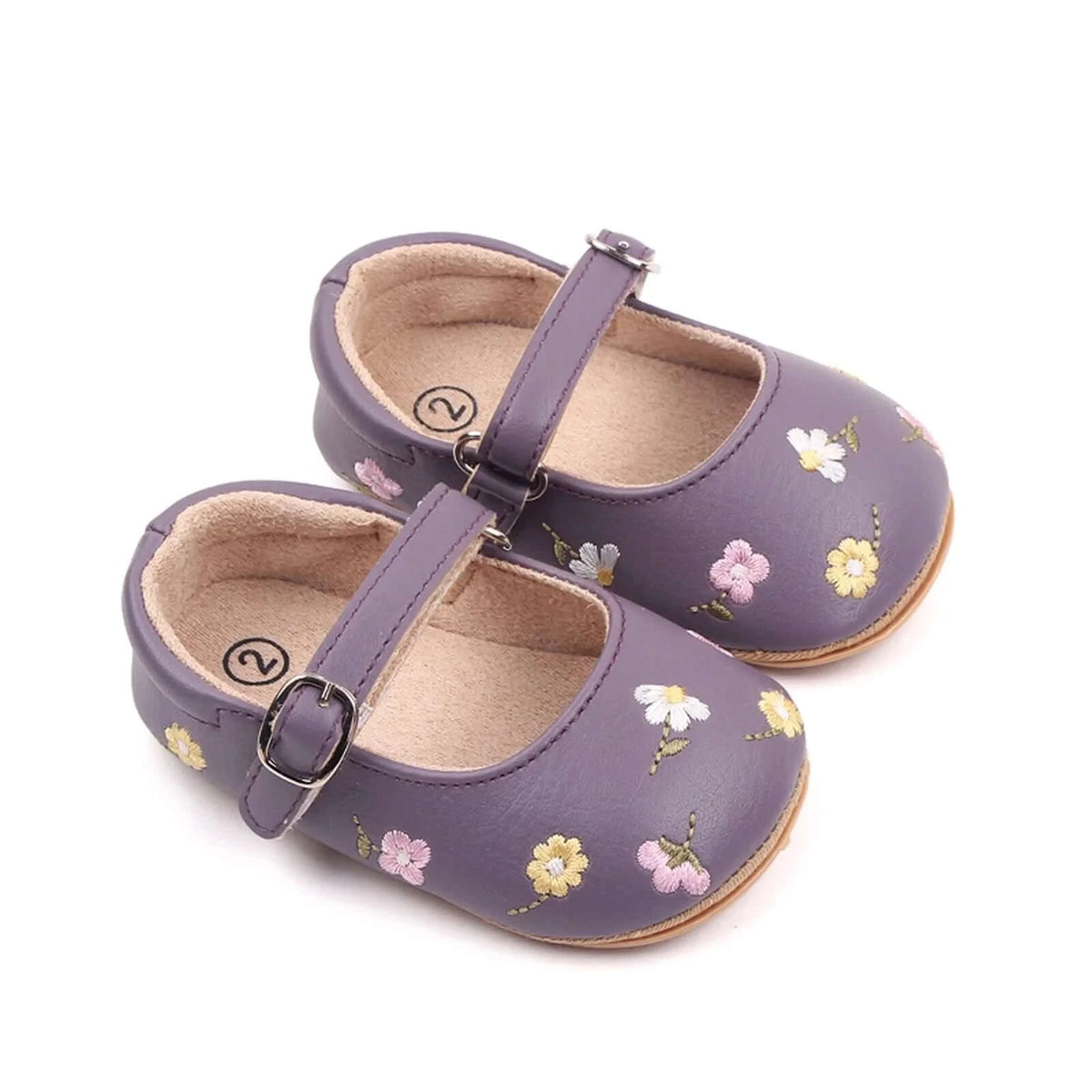 Purple Mary Jane baby shoes in vegan leather with floral embroidery and faux buckles
