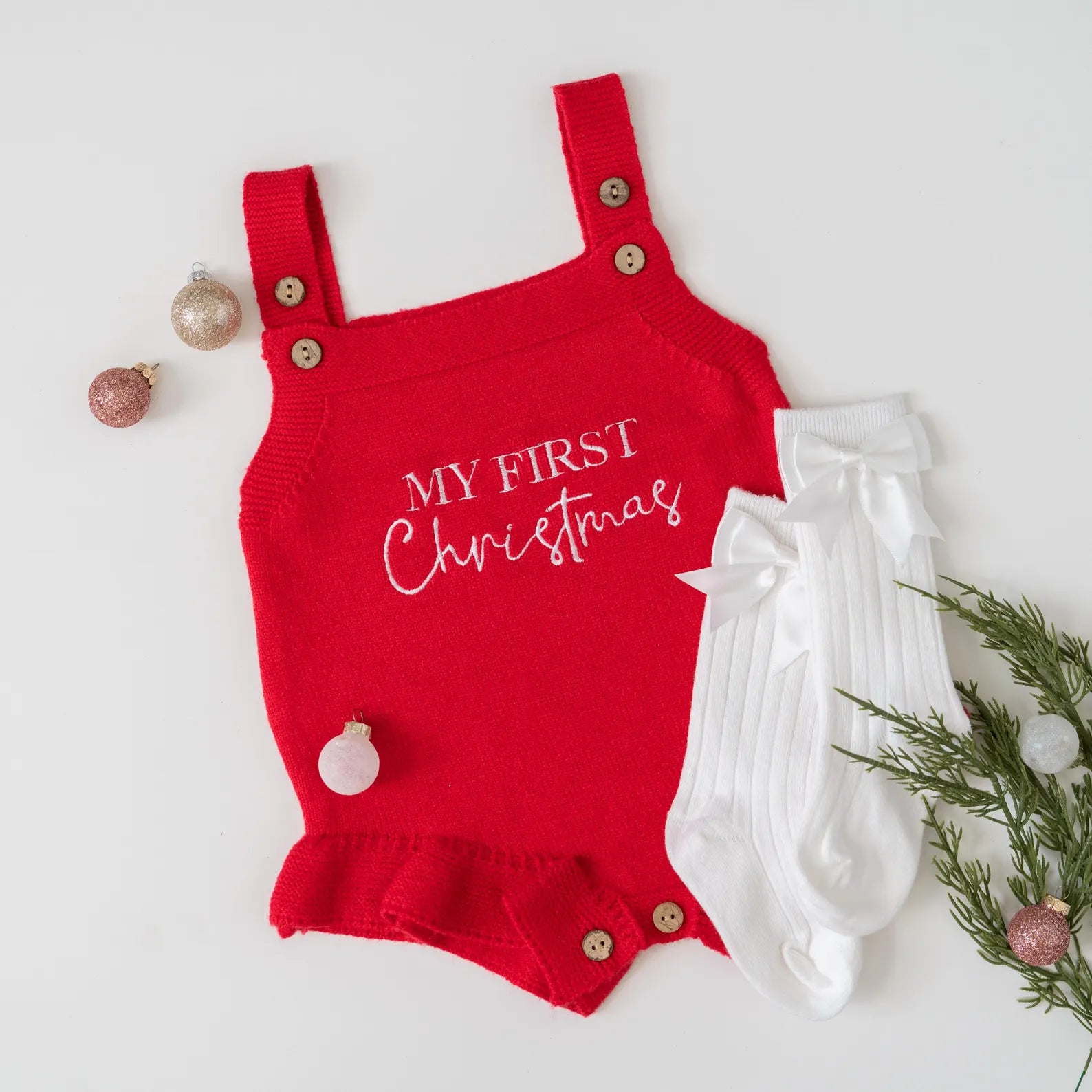 My First Christmas Romper flatlay, a perfect baby christmas outfit for girls.