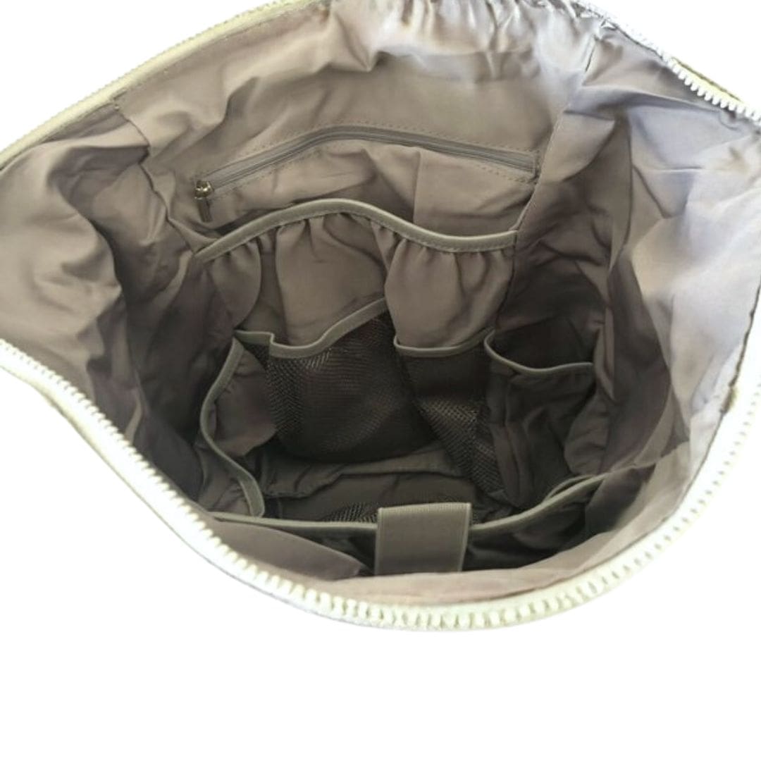 Neoprene Nappy Backpack - inside view showing multiple pockets