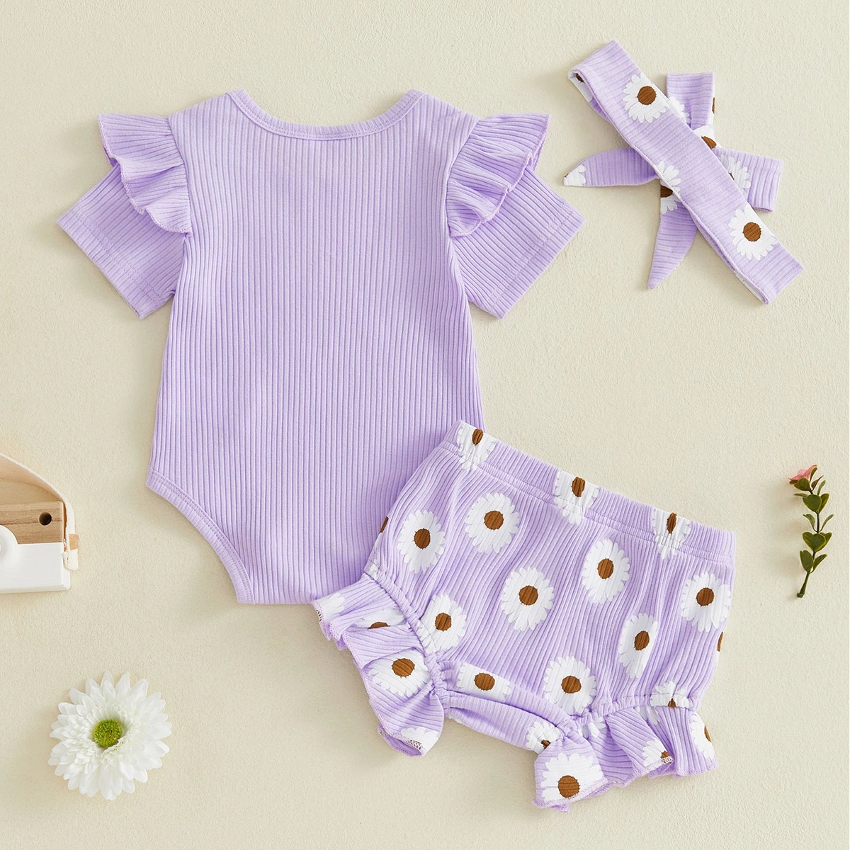 Back view of lilac baby girl outfit - "I'm New Here"