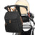 Stylish black quilted nappy backpack attached to stroller with integrated pram straps