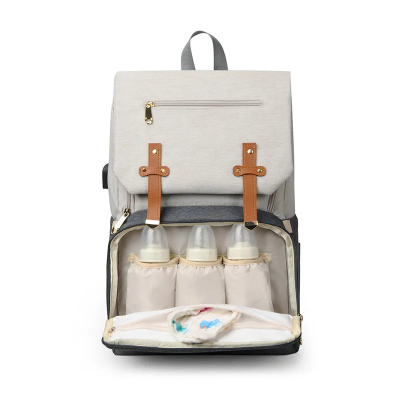 Oslo nappy backpack with front insulated bottle pockets in white and grey