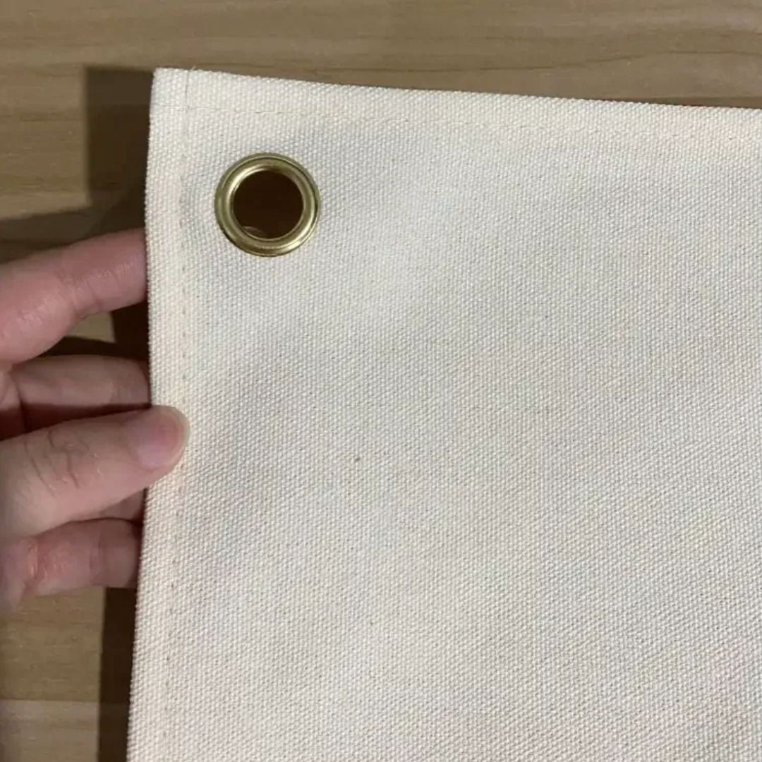 Nursery canvas wall hanging - closeup image showing hole for hanging