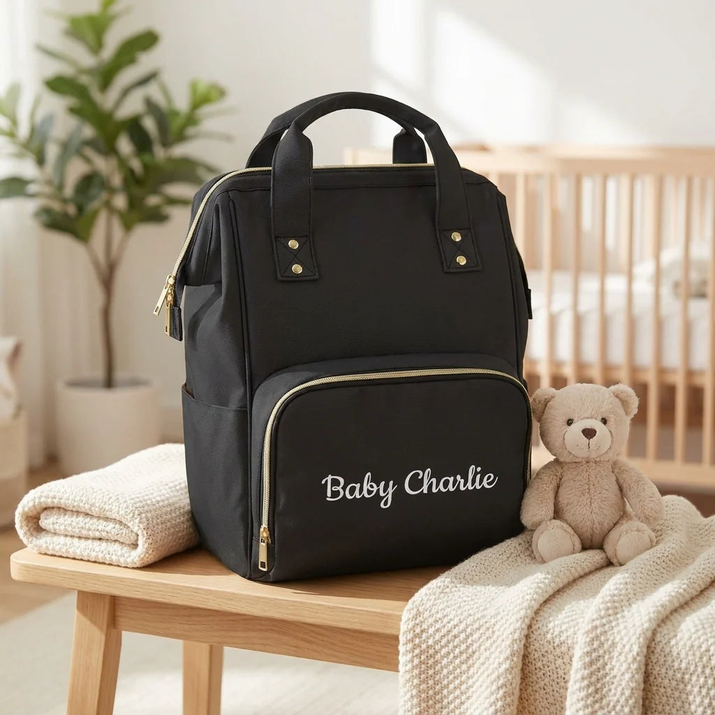 Black nappy bag personalised with name