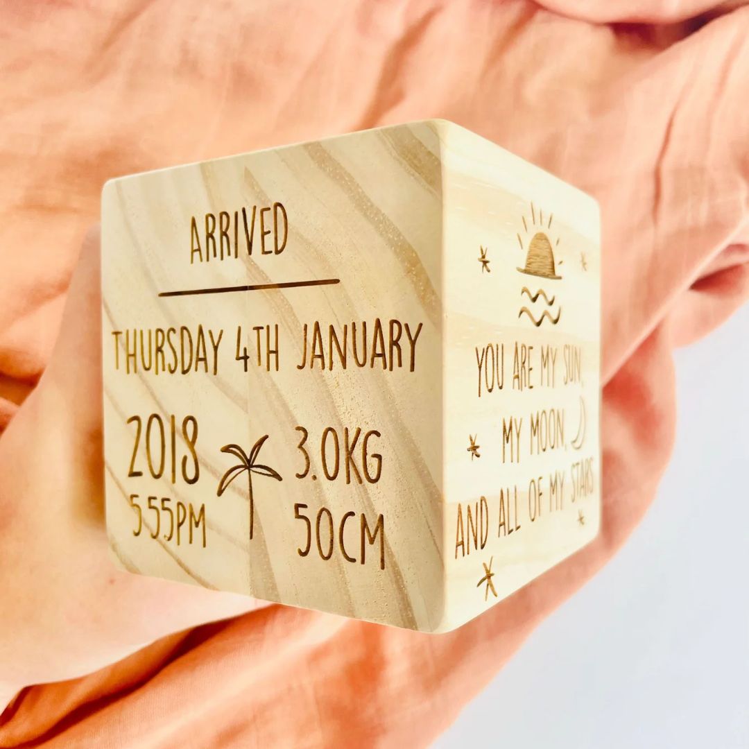 Timber block engraved with baby's name and birth details