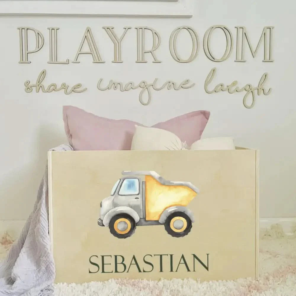 Personalised Wooden Toy Box featuring a playful truck design, perfect for a child's playroom.
