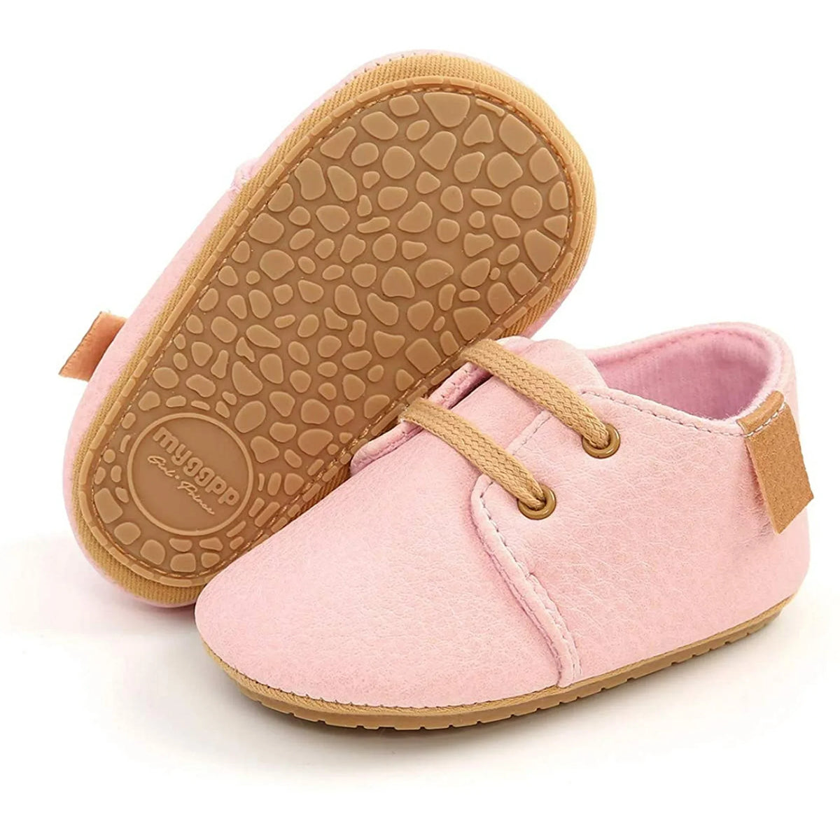 Pink lace-up oxford style baby shoes with non-slip soles