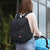 Mum carrying a stylish Quilted Chevron Nappy Backpack.