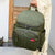 Stylish Quilted Chevron Nappy Backpack in olive green.
