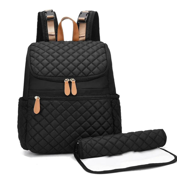Stylish black quilted nappy backpack with matching changing mat