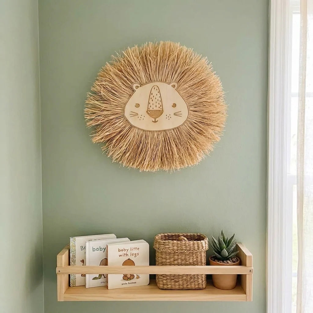 Raffia lion wall hanging on green nursery wall