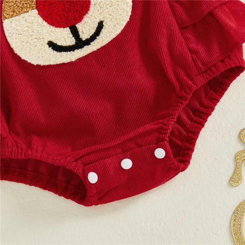 Close-up of Reindeer Ruffle Romper in red with a reindeer face appliqué and snap buttons for baby girl Christmas outfit.