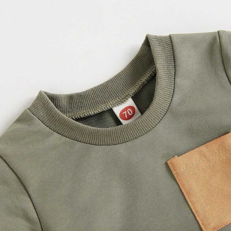 Riley Striped Shorts Set in olive green - closeup of t-shirt with contrast pocket