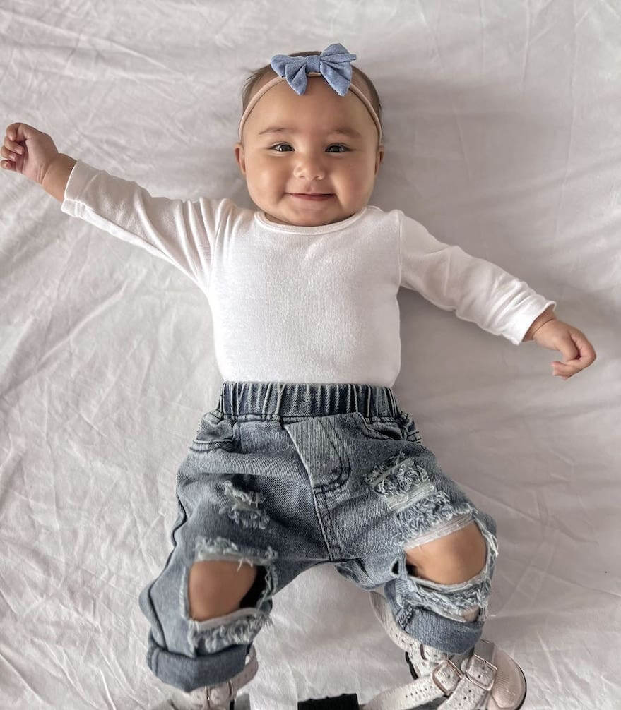 Baby girl wearing distressed baby jeans (in 0-6 months, 6-12 months, 12-18 month,  18-24 months & 2-3 years) - Lulu Babe