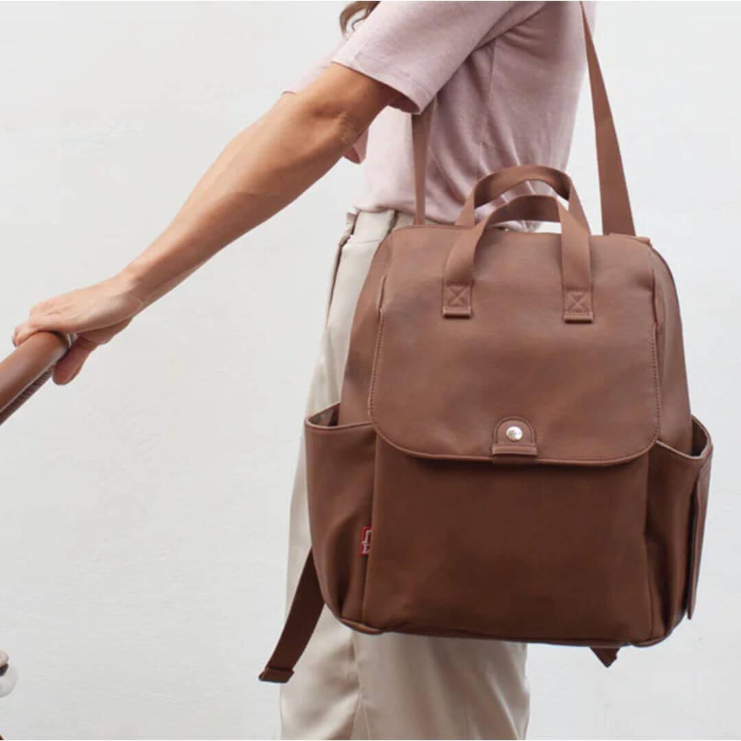 Tan backpack 2025 changing bag