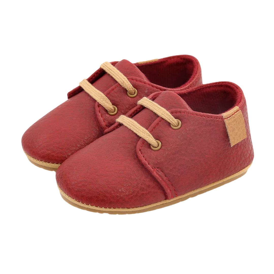 Oxford style baby shoes in rust
