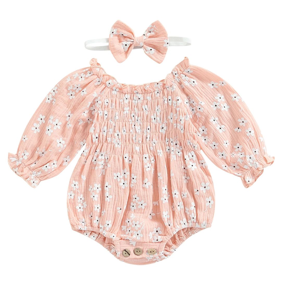 Sadie Boho Romper in pink with floral print and matching bow headband, perfect baby girl outfit.