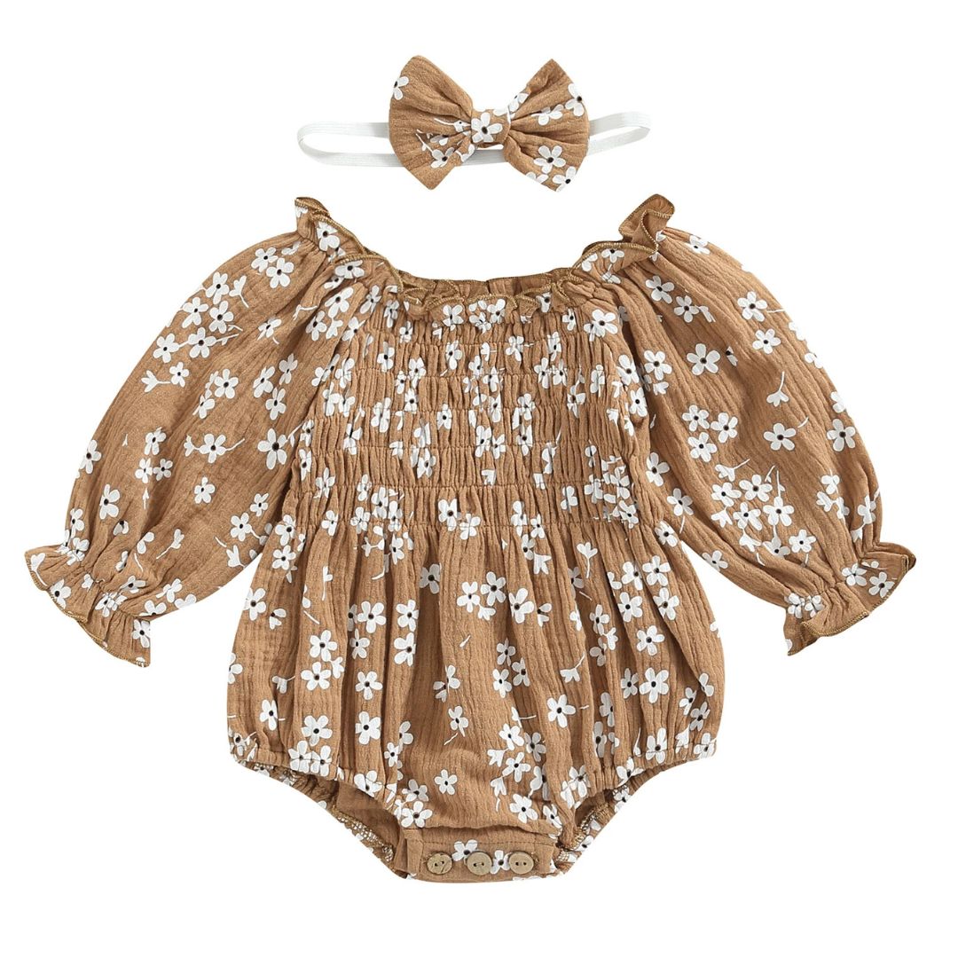Tan floral baby romper for girls with puff sleeves, perfect boho style outfit for playdates or gatherings.