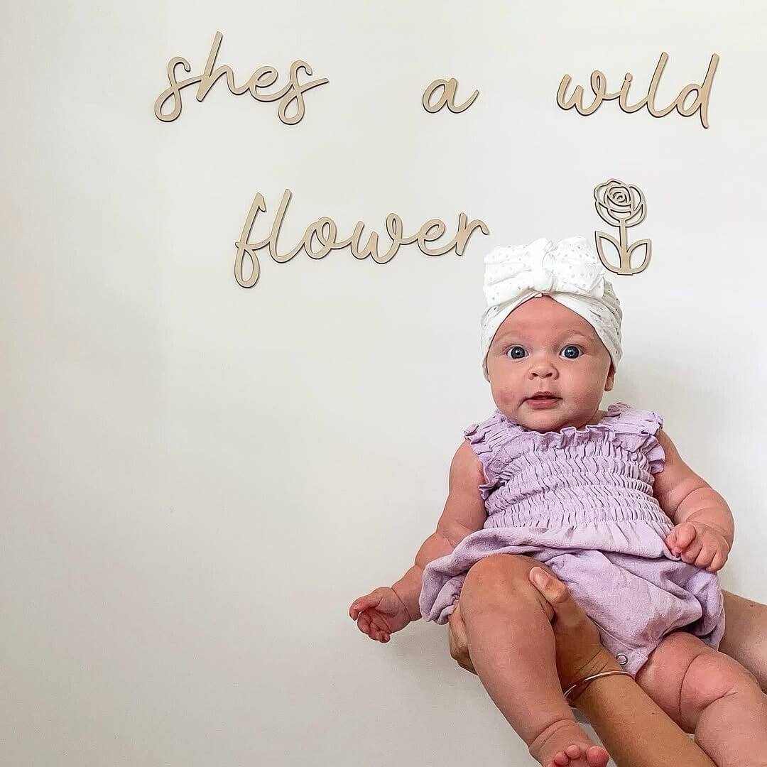 "She's a Wildflower" wooden nursery sign