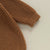Sibling jumper in brown - closeup photo showing the knit texture