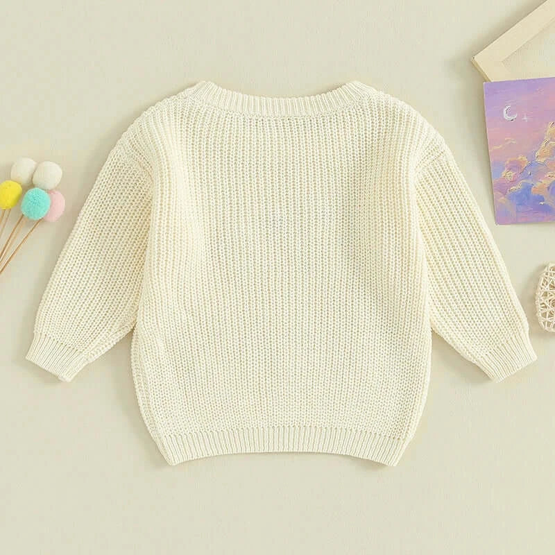 Back view of matching sibling jumper - cream knit