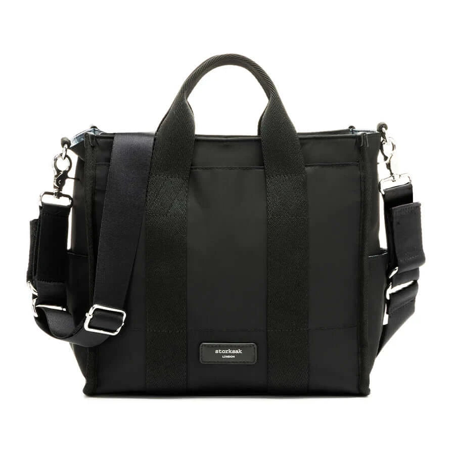 Storksak Thea black tote bag with woven design, perfect for stylish parenting and nappy bag convenience.