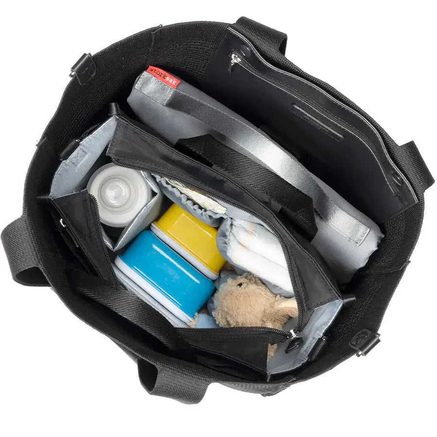 Top view of Storksak Thea Tote with compact nappy bag and changing mat inside