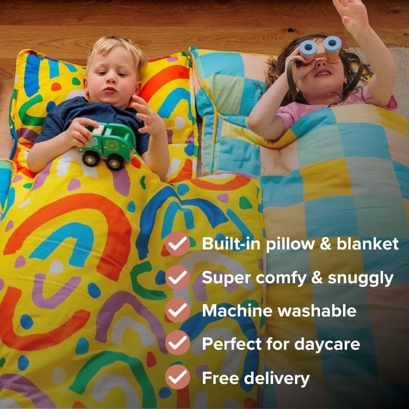 Kids nap mat benefits, showing two children playing in their nap mats from Lulu Babe