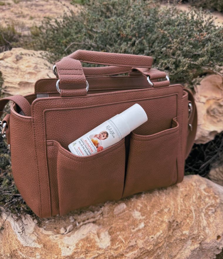 VANCHI Amelia nappy bag styled outdoors