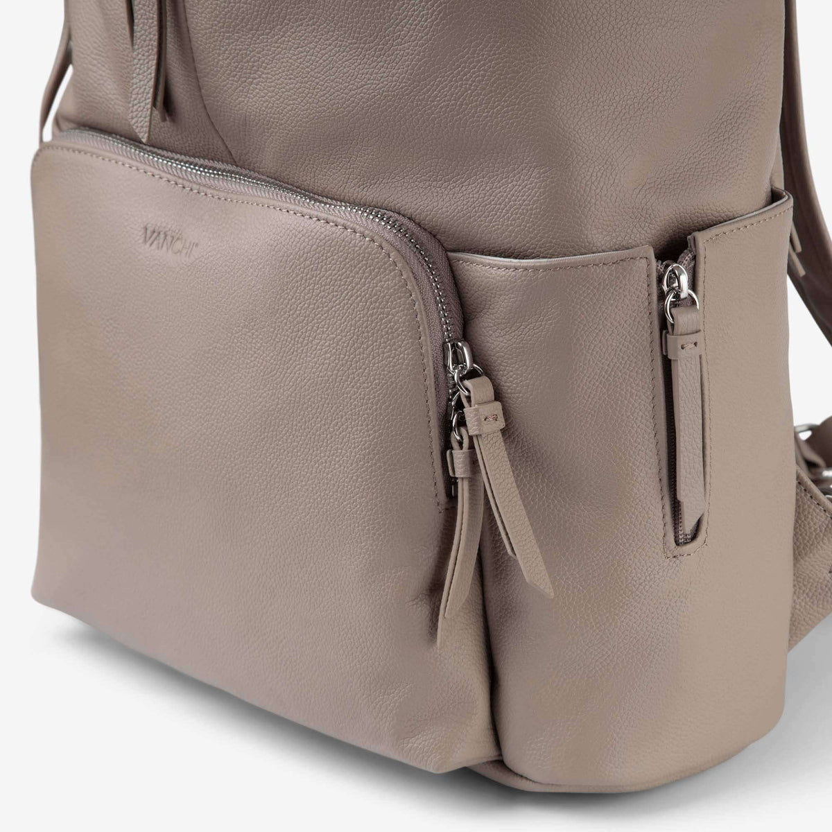 Close-up of the Frankie's front pocket and expandable side pocket zip in pebbled leather