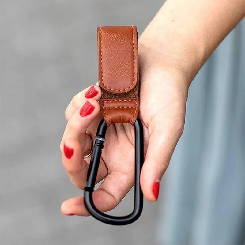 Universal Pram Clips with a strong aluminium hook and vegan leather strap for strollers and prams