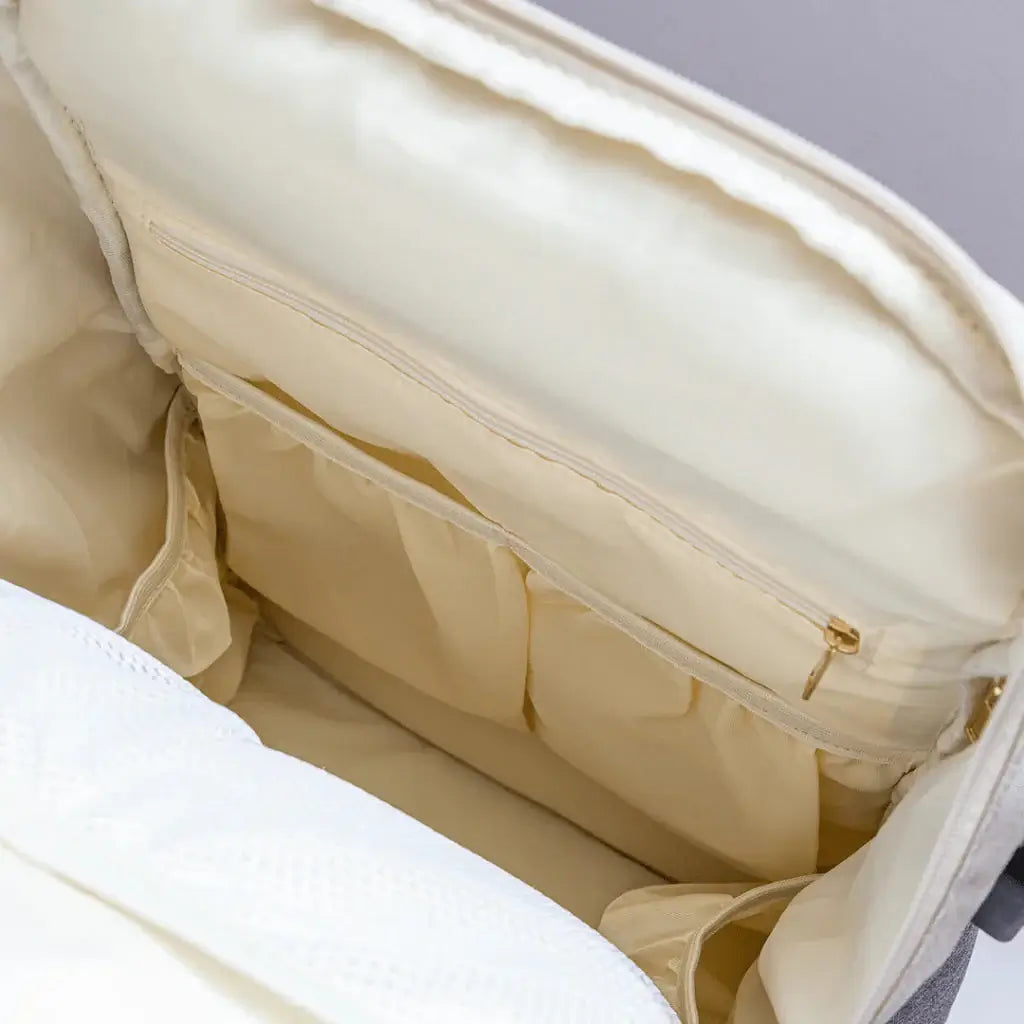 Interior view of the Vienna Nappy Backpack, showcasing spacious pockets and lightweight design, ideal for a baby backpack.